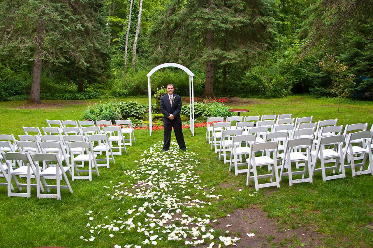 Groom waiting for guests to arrive