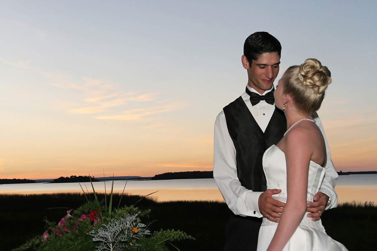 Bride and groom at Lakeshore at sunset
