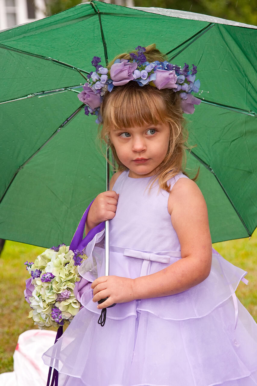 Flower girl with umbrella