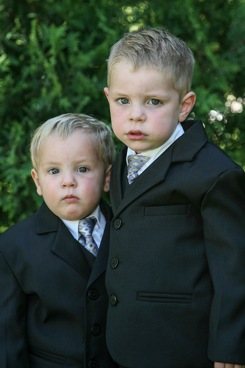 Two young boys at a wedding